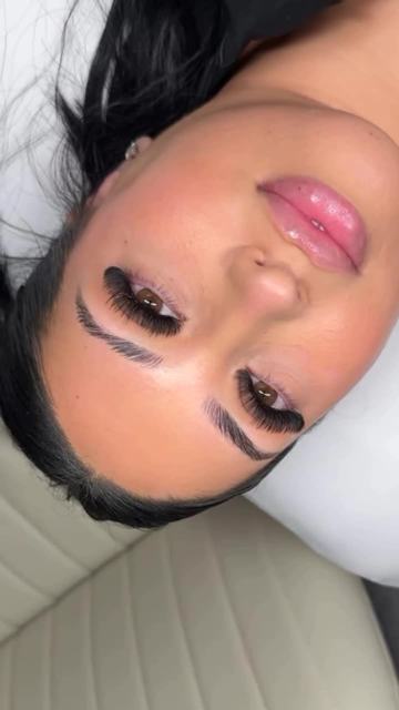 Freshly tinted, shaped brows on a client lying back